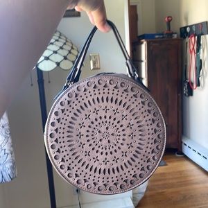 This purse Is circle but has a lot of room inside